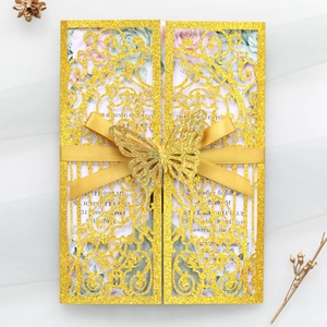 Glitter gold laser-cut wedding invitation with elegant 3D butterfly and silk ribbon