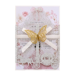 Glitter silver laser cut wedding invitation with pumpkin carriage design and gold butterfly