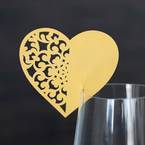 Golden heart laser-cut name card for wedding glasses with elegant vine patterns