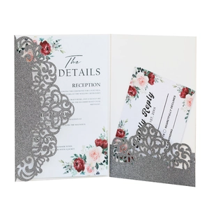 Elegant silver glitter laser-cut wedding invitation with floral insert and RSVP card