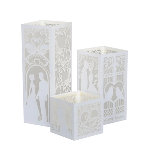 3-piece set of laser-cut white paper lanterns with romantic swan and heart patterns