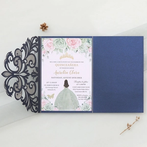Intricate laser-cut navy blue floral lace wedding invitation with elegant card details