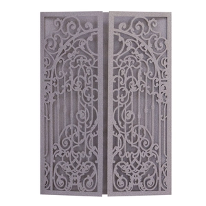 Detail of laser-cut gate design on pearlescent lavender gray wedding invitation cover