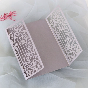 Detailed laser-cut hollow pattern on light purple pearlescent wedding invitation card