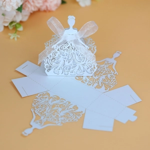 Detailed laser-cut bridal gown candy box with ribbon and flat-pack assembly view