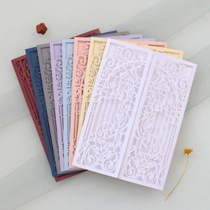 Detailed laser-cut gate patterns on wedding invitation covers in eight assorted colors