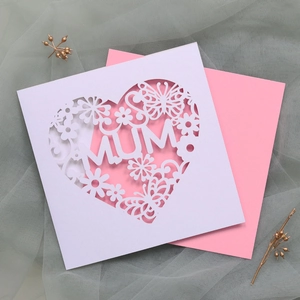 Detailed laser-cut heart and butterfly patterns with MUM text on a floral greeting card