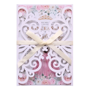 Elegant laser-cut Quinceañera invitation with pink floral insert and beige ribbon bow