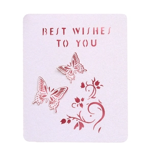Detail showing laser-cut 'BEST WISHES TO YOU' text and butterfly motifs on purple card