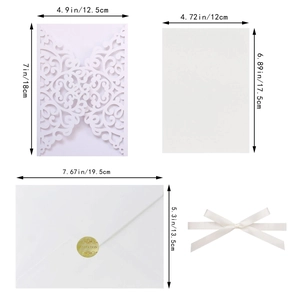 Laser cut wedding invitation kit with intricate floral patterns, ribbon, and seal sticker