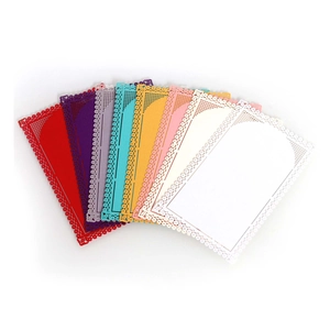 Detailed fan-shaped layout of colorful laser-cut lace paper cards with hollow edges