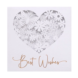 Close-up of laser-cut heart pattern with butterfly and gold foil Best Wishes text