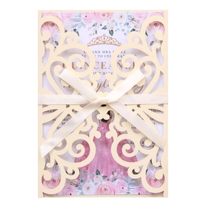 Elegant laser-cut beige Quinceañera invitation with pink floral lining and satin ribbon
