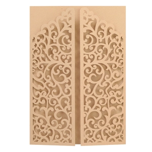 Detailed laser-cut hollow lace wedding invitation with intricate golden pearlescent texture