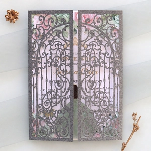 Detailed view of laser-cut glitter silver wedding card with floral pink rose insert