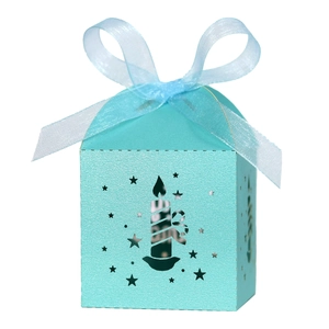Detailed laser cut star and candle patterns on Tiffany blue gift box with ribbon