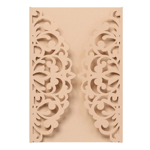 Elegant champagne pearlescent paper laser-cut wedding invitation cover with floral pattern