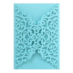 Elegant light blue laser-cut wedding invitation cover with intricate floral patterns