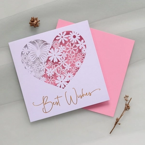 Detail of laser-cut heart butterfly card with gold stamped Best Wishes text and envelope