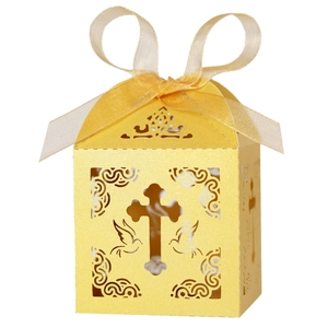Laser-cut white cross and dove favor box with elegant gold ribbon for festive parties