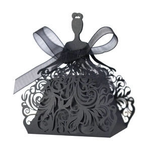 Elegant black laser-cut dress-shaped wedding candy box with delicate vine patterns and ribbon