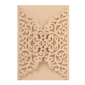 Laser cut champagne gold wedding invitation cover with intricate floral patterns