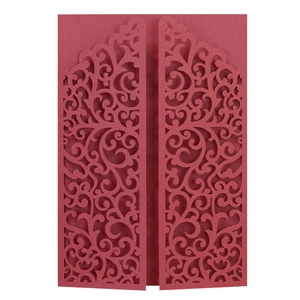 Detailed laser cut floral vine pattern on burgundy gatefold wedding invitation cover
