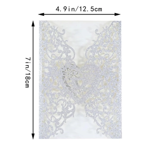 Silver glitter laser-cut invitation cover with heart design and 5x7 inch dimensions