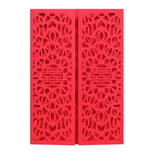 Detail of red wedding invitation featuring laser-cut double happiness pattern