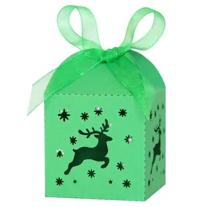 Green Christmas reindeer hollow candy box with silk ribbon and snowflake laser cutouts