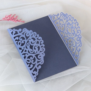 Detail showing navy and lavender laser-cut pocket with intricate scrollwork patterns