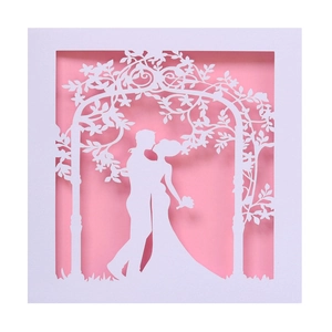European laser-cut wedding invitation card featuring a romantic couple silhouette under a floral arch