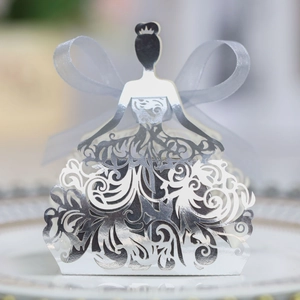 Detailed silver laser-cut wedding favor box in elegant dress shape with blue ribbon bow