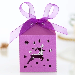 Detailed laser-cut purple reindeer candy box with star patterns and organza ribbon