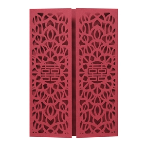 Detail of red laser-cut wedding invitation with hollow Double Happiness Chinese character