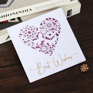 Detailed laser-cut heart and butterfly design on Best Wishes greeting card