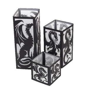 Set of three black hollow dinosaur pattern paper lanterns for festive ambient lighting