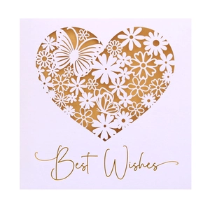 Detail of laser-cut heart pattern with butterflies and gold Best Wishes lettering