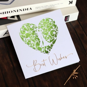 Detailed laser-cut green heart design with Best Wishes gold foil on premium white card