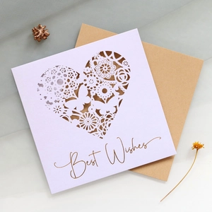 Detail of laser-cut heart and butterfly greetings card with kraft paper envelope