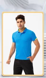 Detail of royal blue polo shirt with lime green contrast lining on collar and sleeves