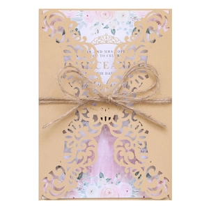 Laser-cut wedding invitation with kraft paper, pink floral inner card and twine bow