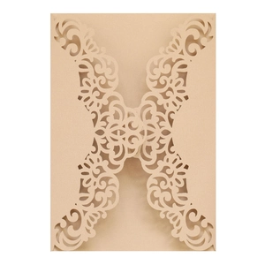 Elegant champagne gold laser-cut floral invitation cover with pearlescent finish