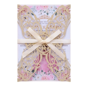 Elegant gold glitter laser cut butterfly wedding invitation with a cream satin bow