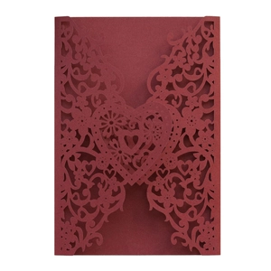 Burgundy laser cut wedding invitation cover with heart shape lock and floral patterns