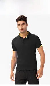 Detail of men's black polo shirt with breathable mesh fabric and neon yellow trim