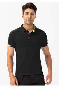 Detail of breathable black sports polo with neon green contrast on collar and sleeves