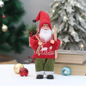 Close-up of a 12-inch standing Santa figure wearing a red knitted reindeer sweater