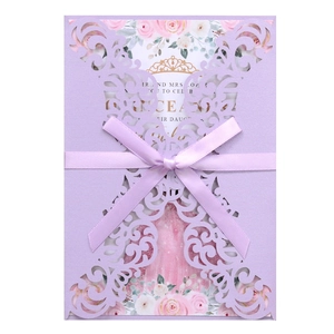 Elegant laser cut lavender wedding invitation with a satin ribbon bow and floral card