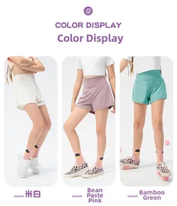 Three-color display of double-layer girls' running shorts in cream, pink, and green